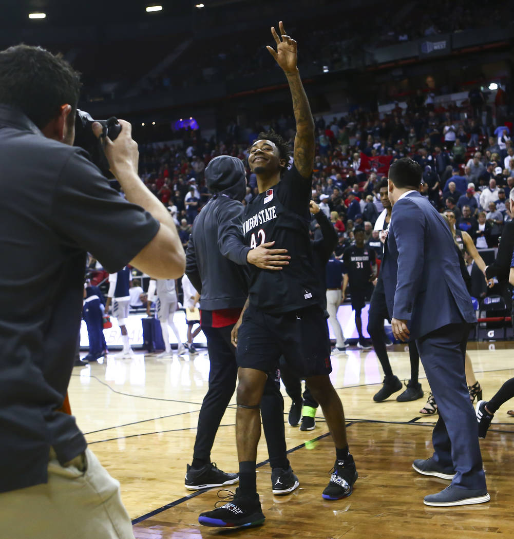 San Diego State Aztecs guard Jeremy Hemsley (42) celebrates his team's win against UNR in a semifinal basketball game at the Mountain West men's basketball tournament at the Thomas & Mack Cent ...