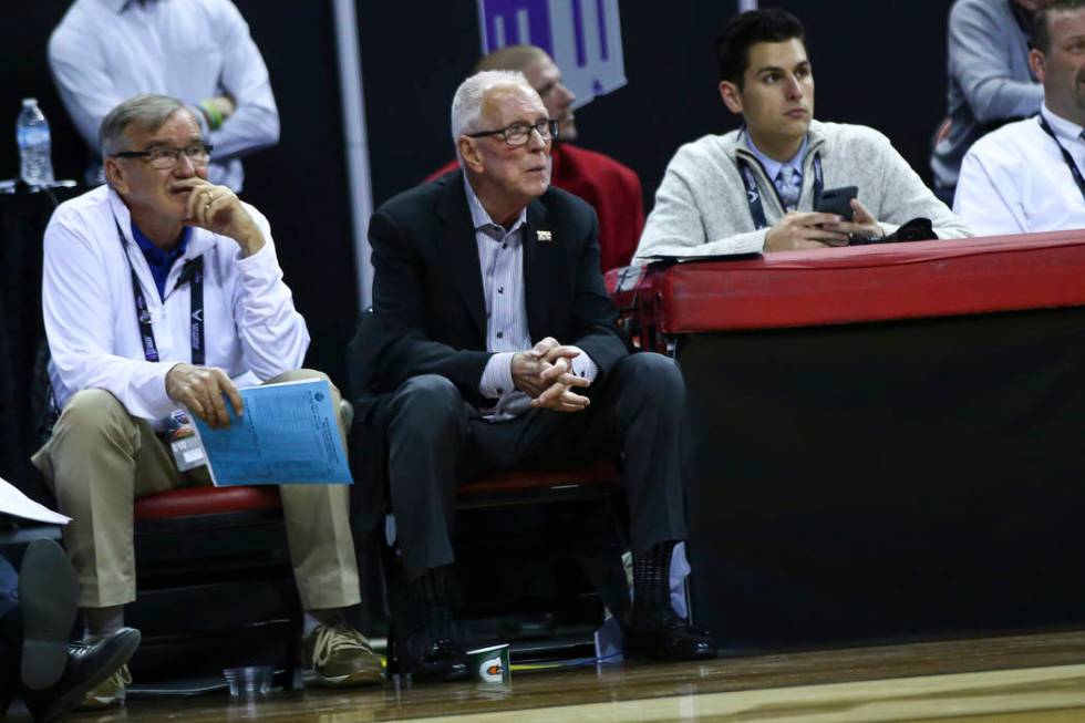 Former San Diego State head coach Steve Fisher looks on during the second half of a semifinal basketball game against UNR in the Mountain West men's basketball tournament at the Thomas & Mack ...