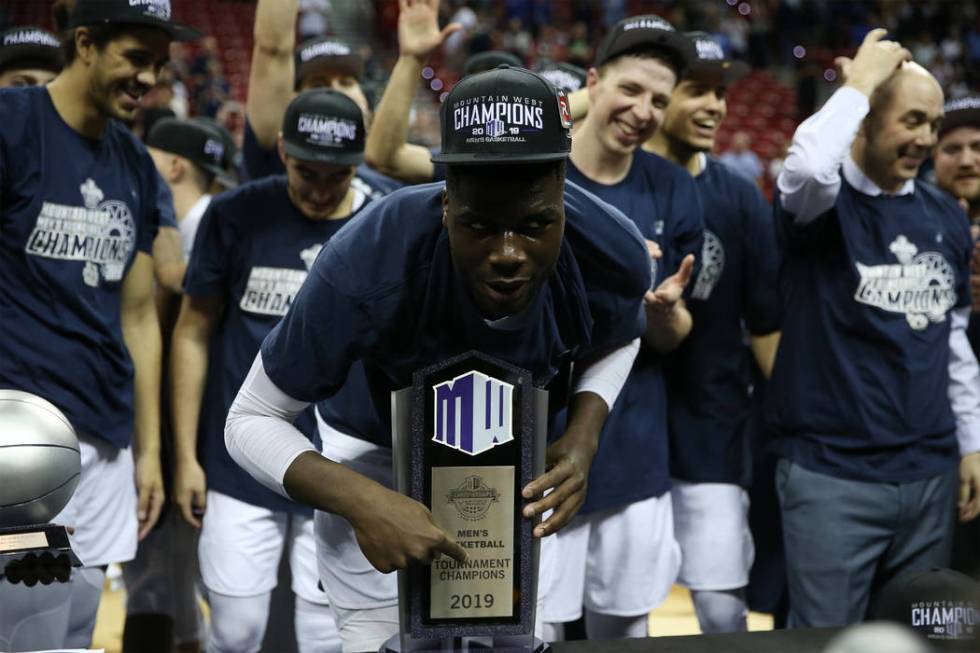 Utah State Aggies center Neemias Queta (23) celebrates their win against San Diego State Aztecs in the Mountain West tournament men's basketball championship game at the Thomas & Mack Center i ...