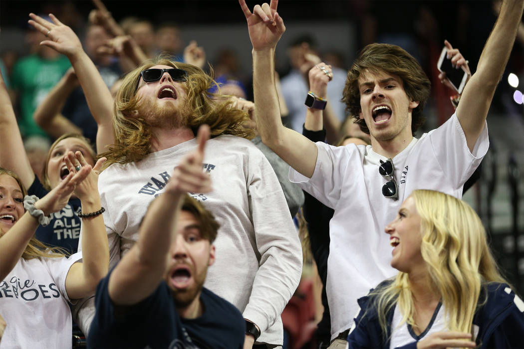 Fans cheer for Utah State Aggies in their game against San Diego State Aztecs in the second half of the Mountain West tournament men's basketball championship game at the Thomas & Mack Center ...