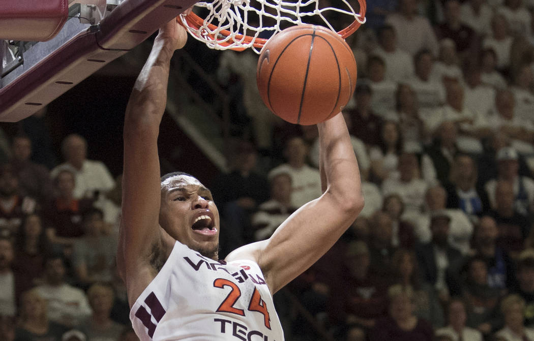 Virginia Tech forward Kerry Blackshear Jr. dunks against Duke during the second half of an NCAA college basketball game in Blacksburg, Va., Tuesday, Feb. 26, 2019. (AP Photo/Lee Luther Jr.)