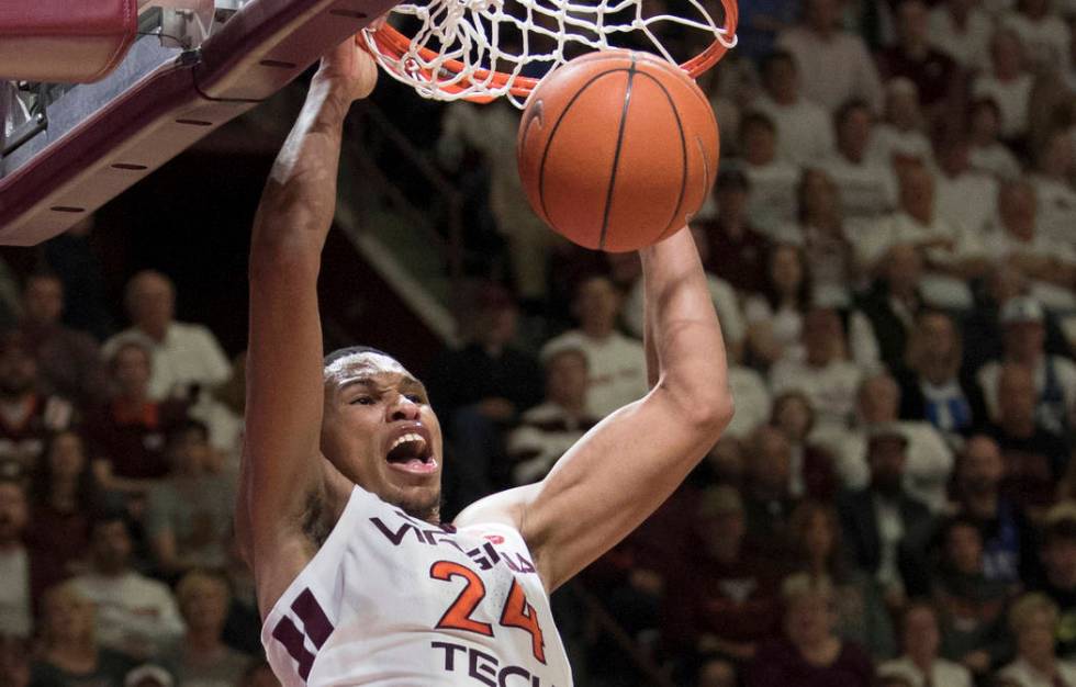 Virginia Tech forward Kerry Blackshear Jr. dunks against Duke during the second half of an NCAA college basketball game in Blacksburg, Va., Tuesday, Feb. 26, 2019. (AP Photo/Lee Luther Jr.)