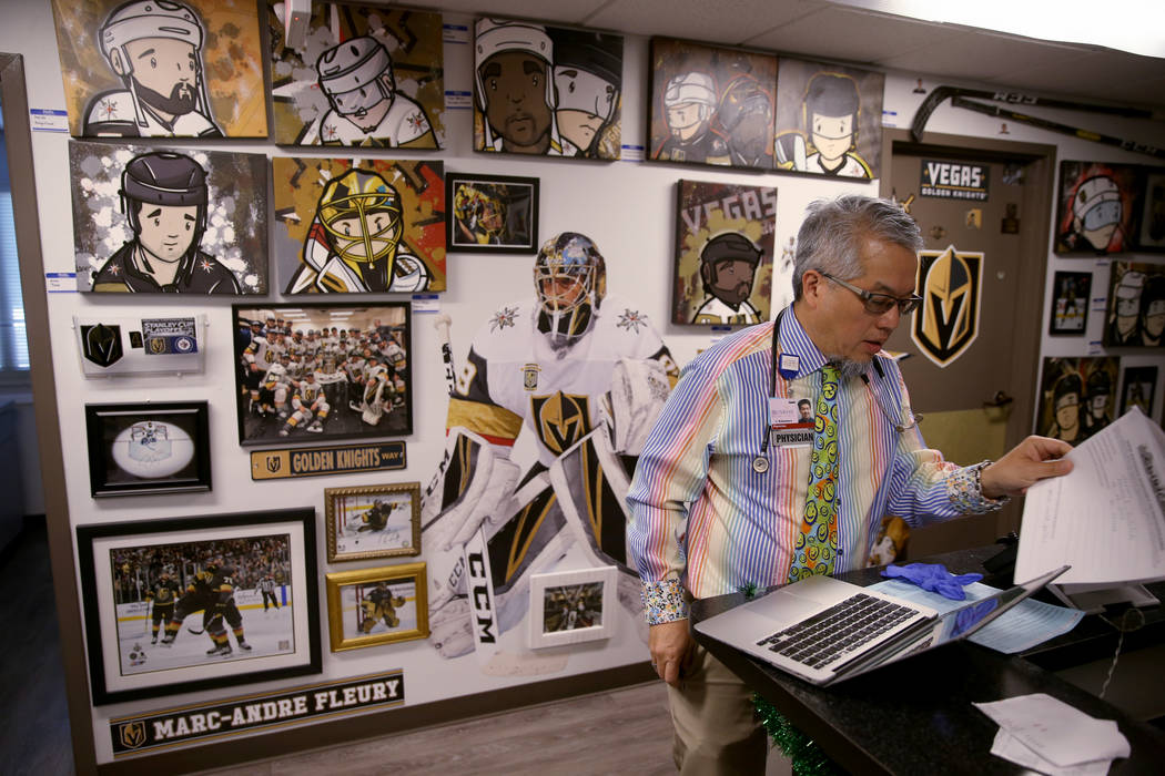 Pulmonologist Dr. Craig Nakamura, director of the Cystic Fibrosis Center of Southern Nevada, works in his Las Vegas office Thursday, March 7, 2019. (K.M. Cannon/Las Vegas Review-Journal) @KMCannon ...