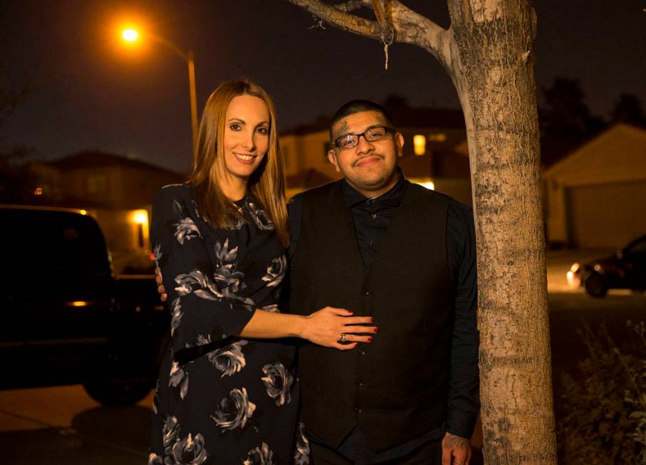 Attorney Alexis Plunkett, left, and her boyfriend Andrew Arevalo, a former gang member, pose at their house in Las Vegas on Thursday, Feb. 22, 2018. (Las Vegas Review-Journal)