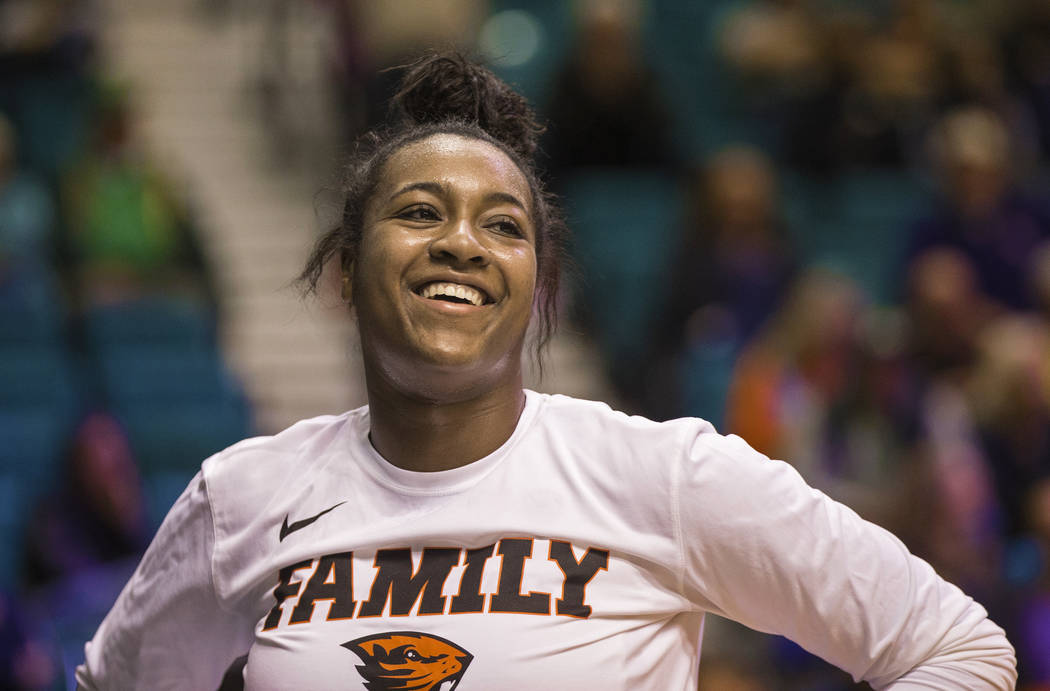 Oregon State junior guard Madison Washington (3), a Las Vegas native and Bishop Gorman graduate, shares a laugh with teammates during warmups before the start of the Beavers Pac 12 Tournament game ...