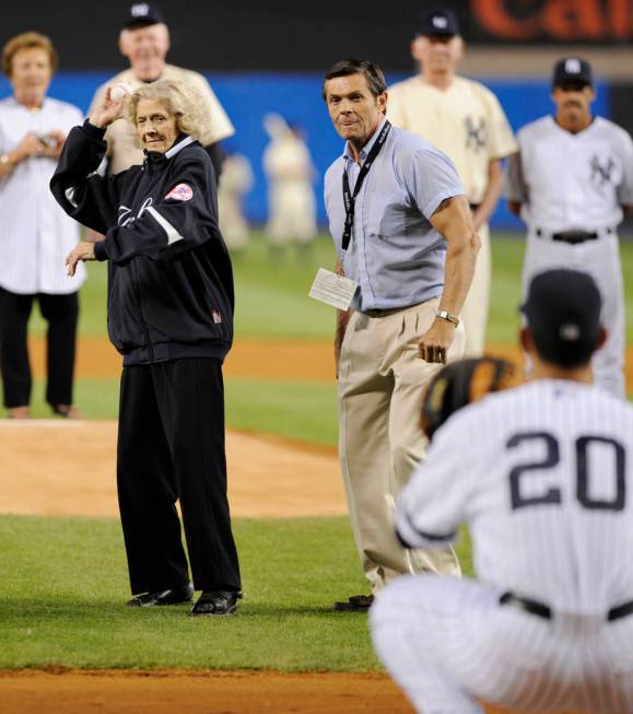 Julia Ruth Stevens, the daughter of former New York Yankee Babe Ruth, throws a pitch to Yankees catcher Jorge Posada during ceremonies at Yankee Stadium in New York on Sunday, Sept. 21, 2008. (AP ...