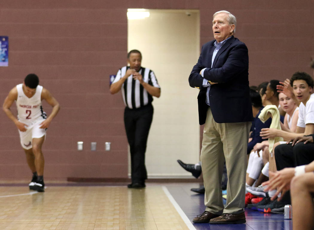 American Preparatory Academy basketball coach and athletic director Dave Bliss, right, shouts instructions to his team during a home game against SLAM Academy in Las Vegas, Thursday, Jan. 17, 2019 ...