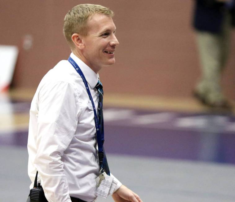 American Preparatory Academy's secondary director, Nik Hulet, attends a varsity basketball game played on the school's campus in Las Vegas, Thursday, Jan. 17, 2019. The charter school's athletic d ...