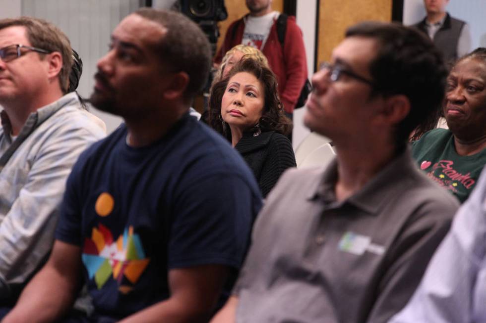 People listen to Washington Gov. Jay Inslee, a Democratic presidential candidate, speaks on climate change at the Nevada Conservation League offices in Las Vegas, Saturday, March 9, 2019. Erik Ver ...