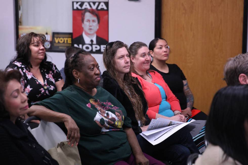 People listen to Washington Gov. Jay Inslee, a Democratic presidential candidate, speaks on climate change at the Nevada Conservation League offices in Las Vegas, Saturday, March 9, 2019. Erik Ver ...