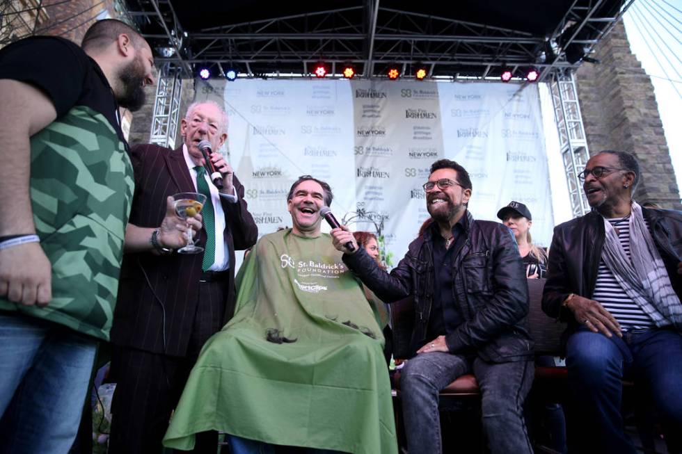 Las Vegas Review-Journal man-about-town columnist John Katsilometes gets his head shaved by former Las Vegas Mayor Oscar Goodman during St. Baldrick's Foundation shave-a-thon on the Brooklyn Bridg ...