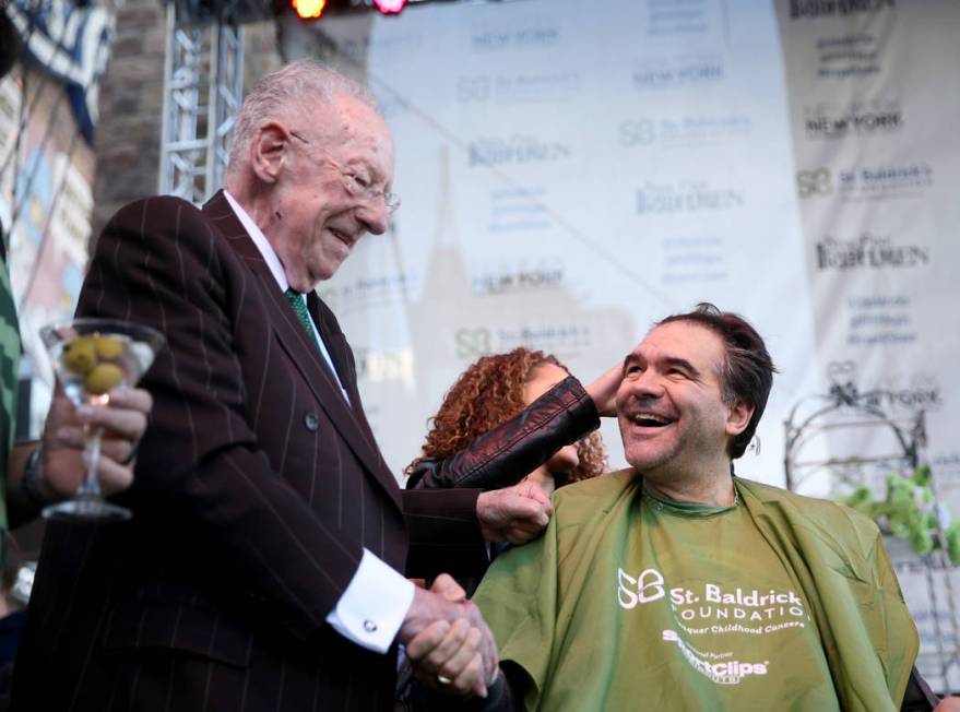 Las Vegas Review-Journal man-about-town columnist John Katsilometes thanks former Las Vegas Mayor Oscar Goodman during St. Baldrick's Foundation shave-a-thon on the Brooklyn Bridge at New York-New ...