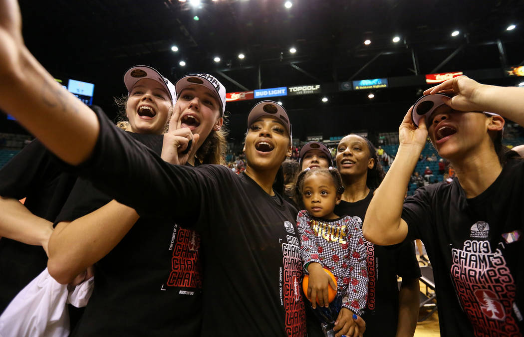 The Stanford Cardinals take a selfie while celebrating after defeating the Oregon Ducks during a NCAA college basketball game in the final of the Pac-12 women's tournament at the MGM Grand Garden ...