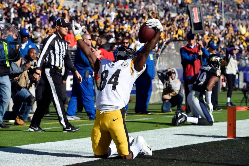 Antonio Brown celebrates after scoring a touchdown in the first half of an NFL football game against the Baltimore Ravens, Sunday, Nov. 4, 2018, in Baltimore. (AP Photo/Gail Burton)