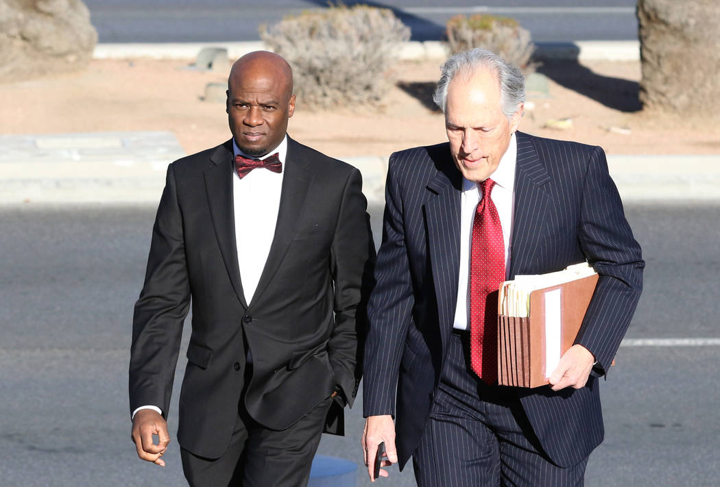 Former Nevada Senate Majority Leader Kelvin Atkinson, left, and his attorney, Richard Wright, arrive at the Lloyd George U.S. Courthouse on Monday, March. 11, 2019, in Las Vegas. Bizuayehu Tesfaye ...