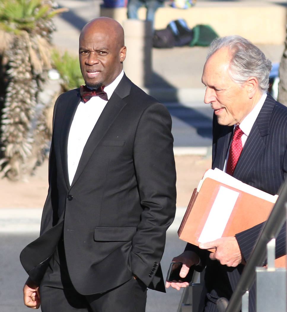 Former Nevada Senate Majority Leader Kelvin Atkinson, left, and his attorney, Richard Wright, arrive at the Lloyd George U.S. Courthouse on Monday, March. 11, 2019, in Las Vegas. Bizuayehu Tesfaye ...