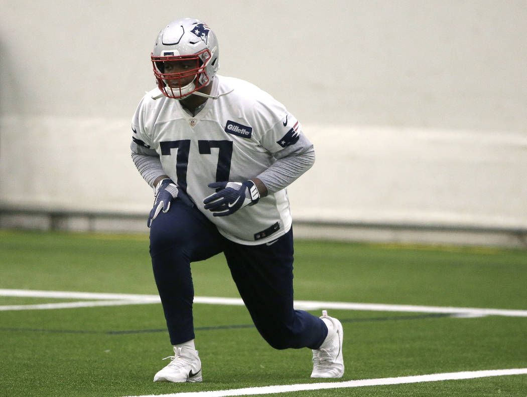 New England Patriots offensive tackle Trent Brown warms up during an NFL football practice, Thursday, Jan. 24, 2019, in Foxborough, Mass. The Los Angeles Rams are to play the New England Patriots ...