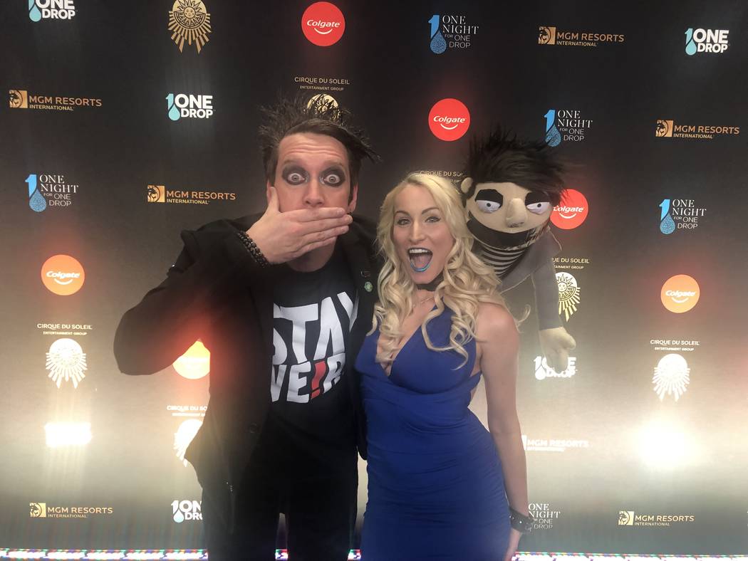 Sam Wills aka Tape Face at Harrah's, and Christina Balonek are shown on the Blue Carpet prior to "One Night For One Drop," held at O Theater at the Bellagio on Friday, March 8, 2019.( John Katsilo ...