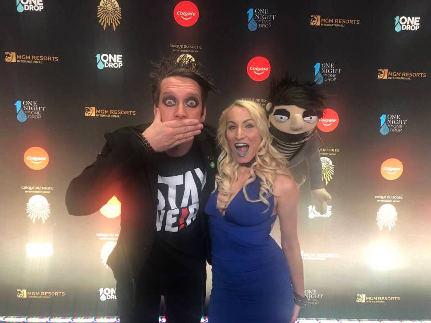 Sam Wills aka Tape Face at Harrah's, and Christina Balonek are shown on the Blue Carpet prior to "One Night For One Drop," held at O Theater at the Bellagio on Friday, March 8, 2019.( John Katsilo ...