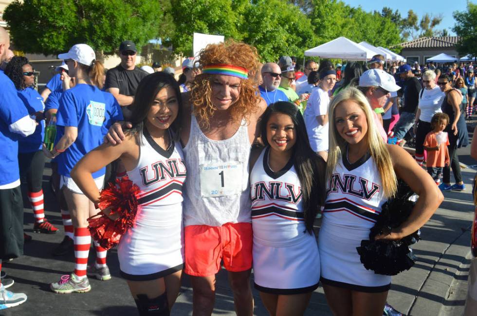 Comedian Carrot Top, posing with UNLV cheerleaders, was among the hundreds who took to the course during the 2018 Runnin’ for the House 5K run and 1-mile Fun Walk. (RMHC Marketing)