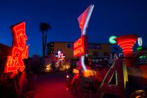 Neon signs light up the boneyard at the Neon Museum at dawn in Las Vegas on Monday, Jan. 28, 2019. (Chase Stevens/Las Vegas Review-Journal) @csstevensphoto
