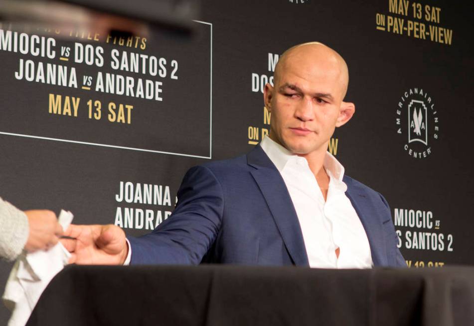 Junior dos Santos shows emotion during the UFC 211 post-fight press conference after being knocked out by UFC heavyweight champion Stipe Miocic at the American Airlines Center in Dallas, Texas, on ...