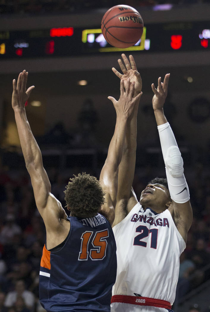 Gonzaga junior forward Rui Hachimura (21) shoots a corner jump shot over Pepperdine freshman forward Kessler Edwards (15) in the first half during the West Coast Conference semifinal game on Monda ...