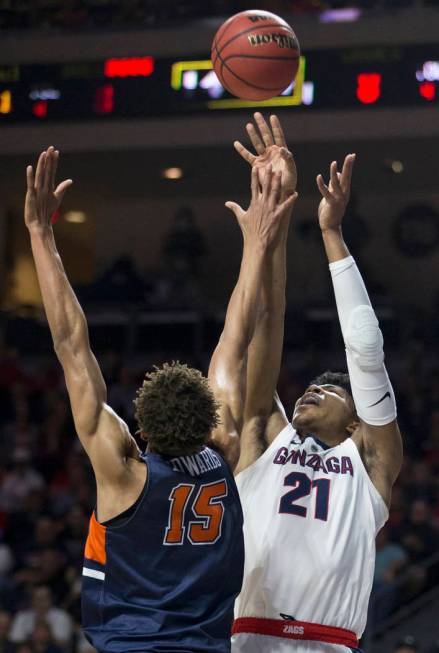 Gonzaga junior forward Rui Hachimura (21) shoots a corner jump shot over Pepperdine freshman forward Kessler Edwards (15) in the first half during the West Coast Conference semifinal game on Monda ...