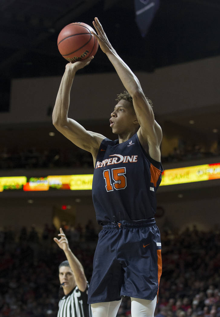 Pepperdine freshman forward Kessler Edwards (15) shoots a corner three in the second half during their West Coast Conference semifinal game with Gonzaga on Monday, March 11, 2019, at Orleans Arena ...