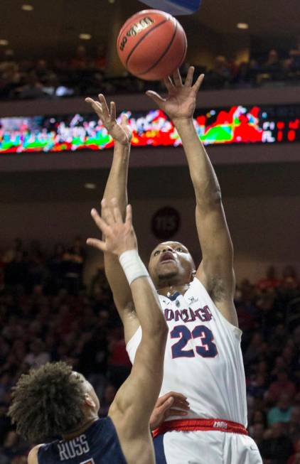 Gonzaga sophomore guard Zach Norvell Jr. (23) shoots over Pepperdine sophomore guard Colbey Ross (4) in the first half during the West Coast Conference semifinal game on Monday, March 11, 2019, at ...