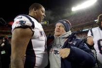 New England Patriots offensive tackle Trent Brown (77) celebrates with head coach Bill Belichick after defeating the Kansas City Chiefs in the AFC Championship NFL football game, Sunday, Jan. 20, ...
