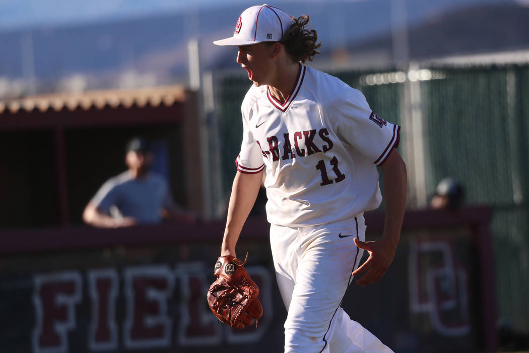 Desert Oasis' Josh Sharman (11) reacts after striking out a Palo Verde player to end the inning in the baseball game at Desert Oasis High School in Las Vegas, Tuesday, March 12, 2019. Erik Verduzc ...