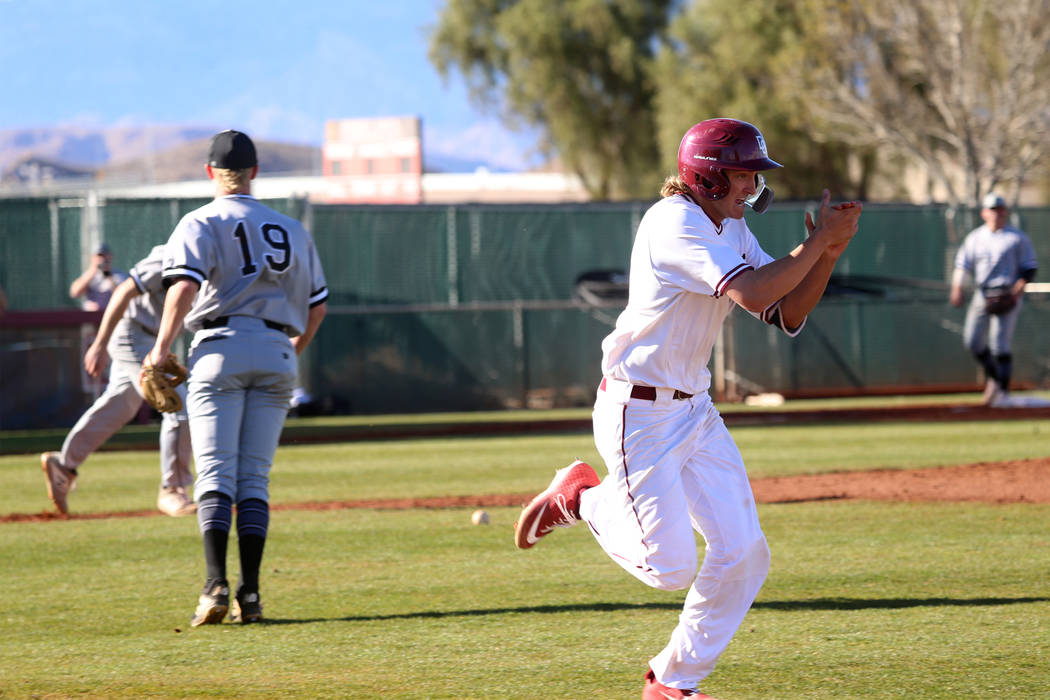 Desert Oasis' Josh Sharman (11) reacts after bunting the ball for a hit against Palo Verde in the baseball game at Desert Oasis High School in Las Vegas, Tuesday, March 12, 2019. Erik Verduzco Las ...