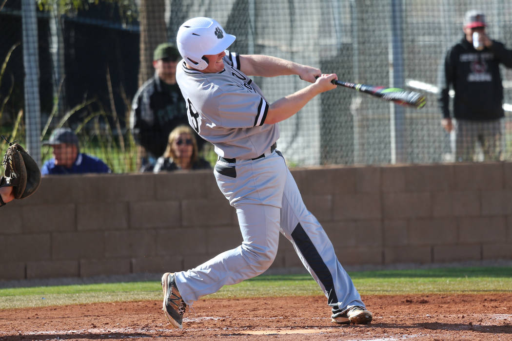 Palo Verde's Hunter Chynoweth (18) hits the ball for a homerun against Desert Oasis in the baseball game at Desert Oasis High School in Las Vegas, Tuesday, March 12, 2019. Erik Verduzco Las Vegas ...