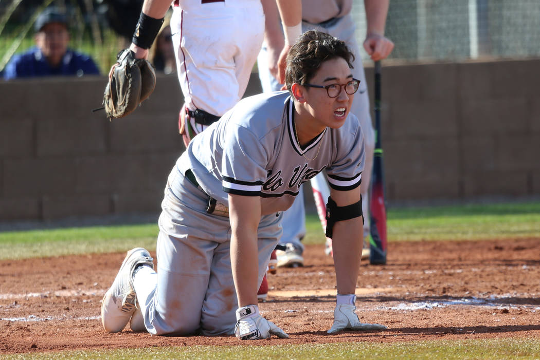 Palo Verde's Tyler Kim (6) injures his leg while batting against Desert Oasis in the baseball game at Desert Oasis High School in Las Vegas, Tuesday, March 12, 2019. Erik Verduzco Las Vegas Review ...