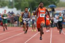 Bishop Gorman's Kyu Kelly competes in the 400-meter relay at the 2018 Class 4A state meet. (Cathleen Allison/Las Vegas Review-Journal)