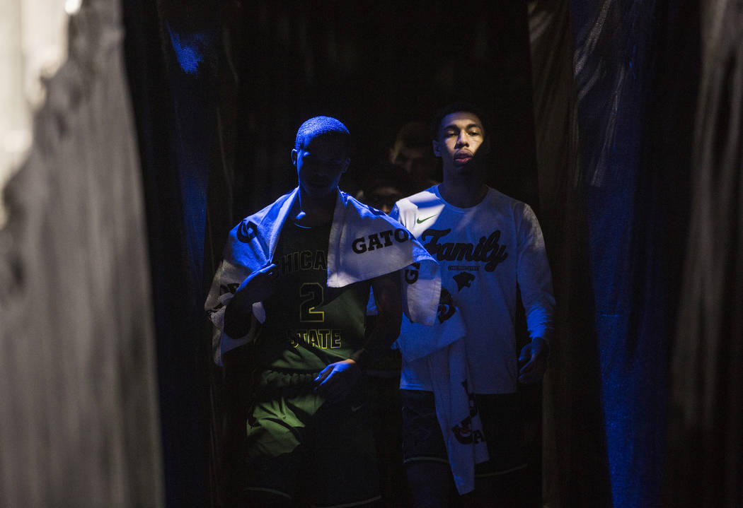 Chicago State senior guard Delshon Strickland (2) and sophomore forward Cameron Bowles (21) walk out of the locker room at the start of the second half of their opening round Western Athletic Con ...