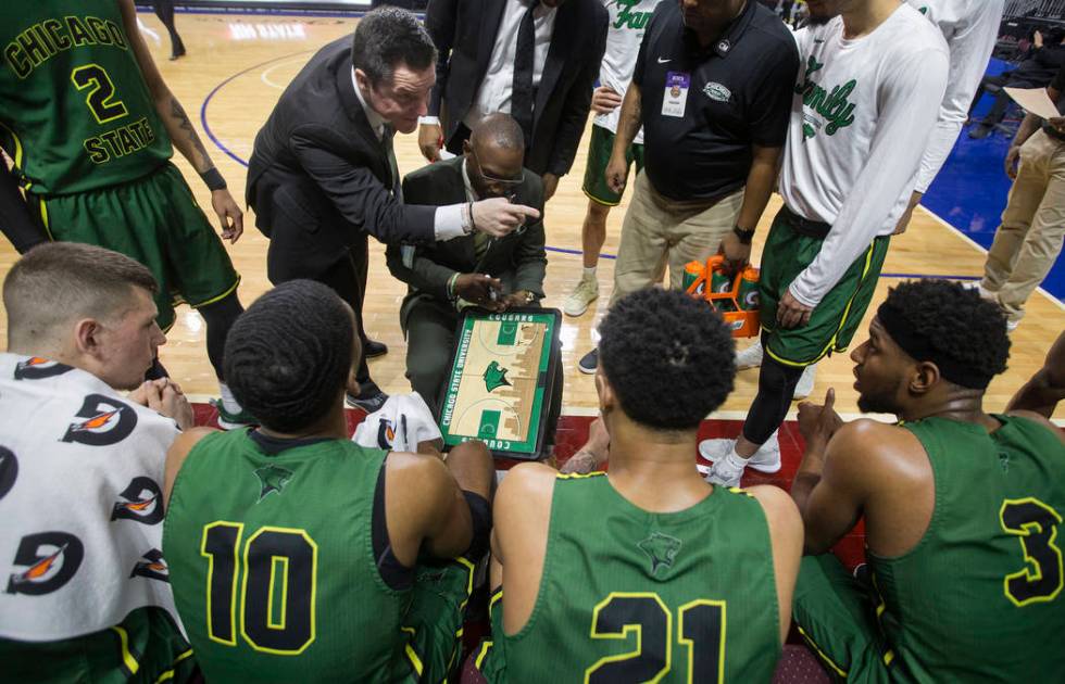 Chicago State gets coached up during a timeout in the second half during the Cougars opening round Western Athletic Conference tournament game with New Mexico State on Thursday, March 14, 2019, at ...