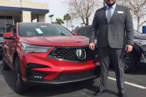 Findlay Acura sales manager Tino Villalobos shows off the newly-designed 2019 RDX SUV at the dealership at 315 Auto Mall Drive. (Findlay)