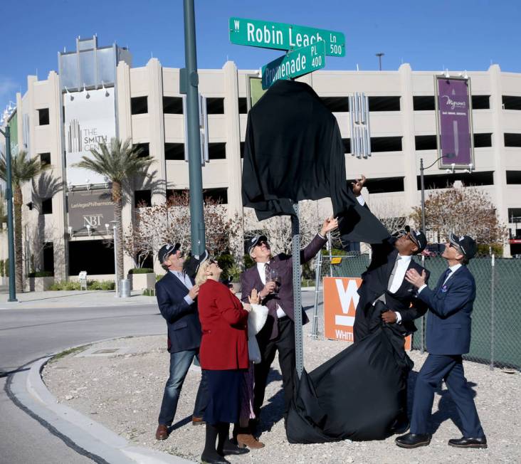 Las Vegas Review-Journal columnist John Katsilometes, from left, Las Vegas Mayor Carolyn Goodman Larry Ruvo, Las Vegas Councilman Cedric Crear and Michael Severino unveil Robin Leach Lane running ...