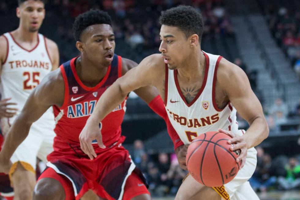 USC junior guard Derryck Thornton (5), a Findlay Prep graduate, drives past Arizona freshman guard Brandon Williams (2) in the first half during the Pac-12 tournament on Wednesday, March 13, 2019, ...