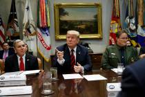 President Donald Trump calls on a reporter during a briefing on drug trafficking at the southern border in the Roosevelt Room of the White House, Wednesday, March 13, 2019, in Washington. (AP Phot ...