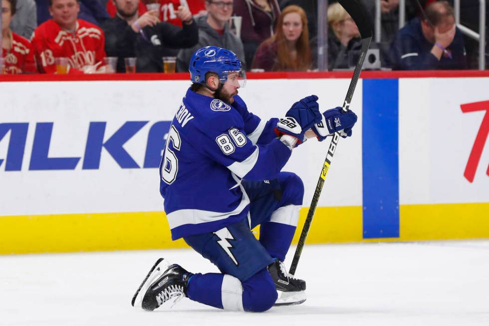 Tampa Bay Lightning right wing Nikita Kucherov (86) celebrates his goal against the Detroit Red Wings in the third period of an NHL hockey game, Thursday, March 14, 2019, in Detroit. (AP Photo/Pau ...