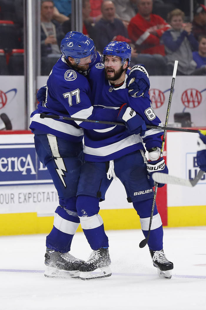 Tampa Bay Lightning right wing Nikita Kucherov (86) celebrates his goal with Victor Hedman (77) in the third period of an NHL hockey game against the Detroit Red Wings, Thursday, March 14, 2019, i ...