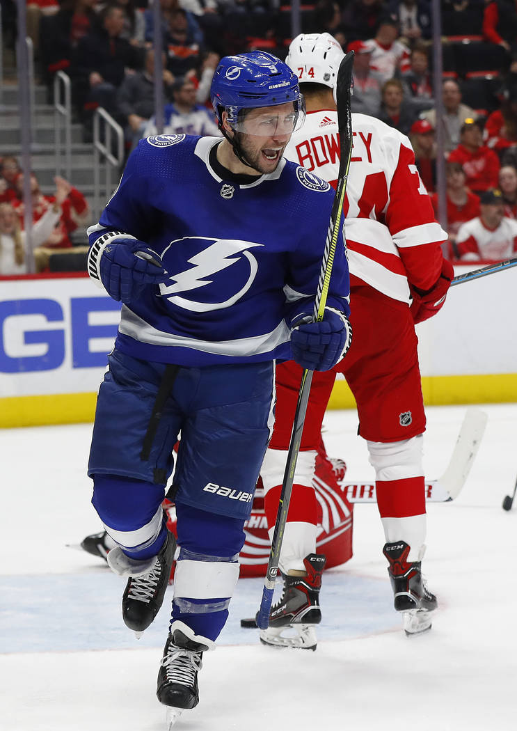 Tampa Bay Lightning center Tyler Johnson (9) celebrates his goal against the Detroit Red Wings in the third period of an NHL hockey game, Thursday, March 14, 2019, in Detroit. (AP Photo/Paul Sancya)