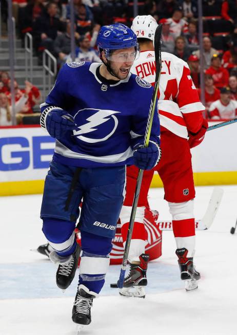 Tampa Bay Lightning center Tyler Johnson (9) celebrates his goal against the Detroit Red Wings in the third period of an NHL hockey game, Thursday, March 14, 2019, in Detroit. (AP Photo/Paul Sancya)