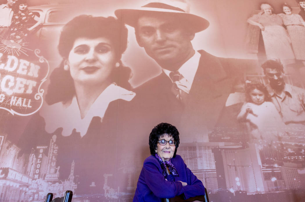 Las Vegas Italian cooking icon Maria Perry, who turned 100 on March 13, stands in her restaurant, Bootlegger Bistro, by a photo imprint of herself and her late husband, Albert Perry, Monday, March ...