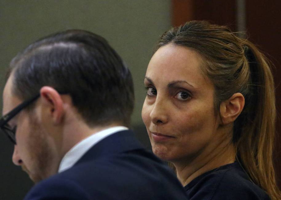 Alexis Plunkett, the jailed Las Vegas defense lawyer, appears in court with her defense attorney Adam Solinger during her bail hearing at the Regional Justice Center on Thursday, March. 14, 2019, ...