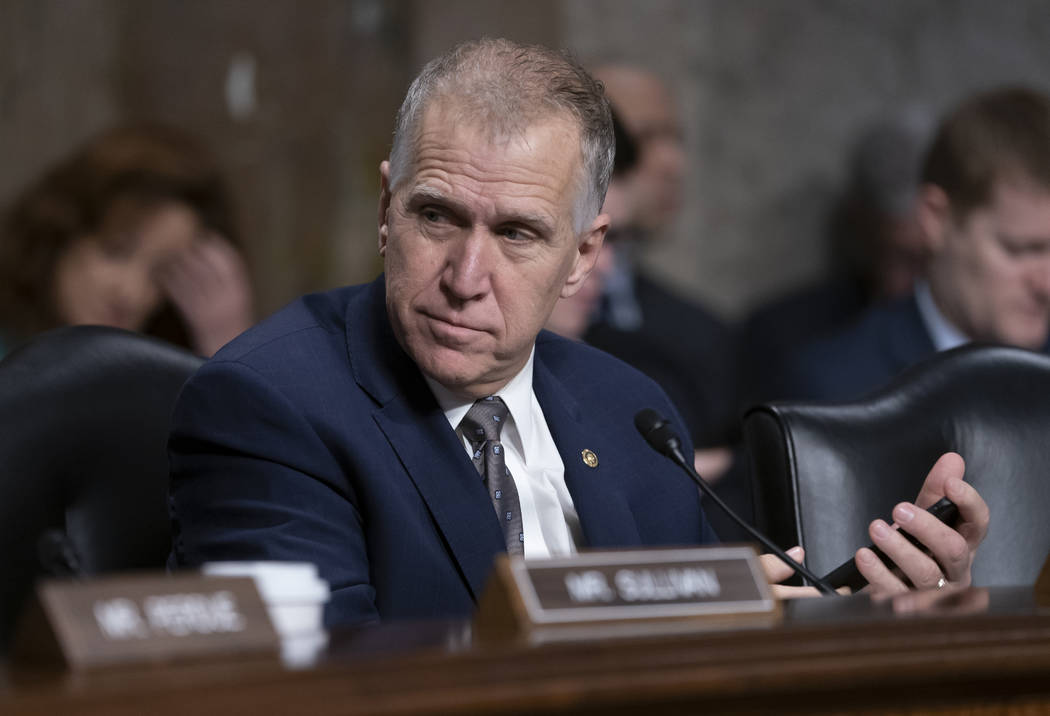 Sen.Thom Tillis, R-N.C., attends a Senate Armed Services hearing on Capitol Hill in Washington, Thursday, March 14, 2019. Tillis has said he will vote to block President Donald Trump's border emer ...