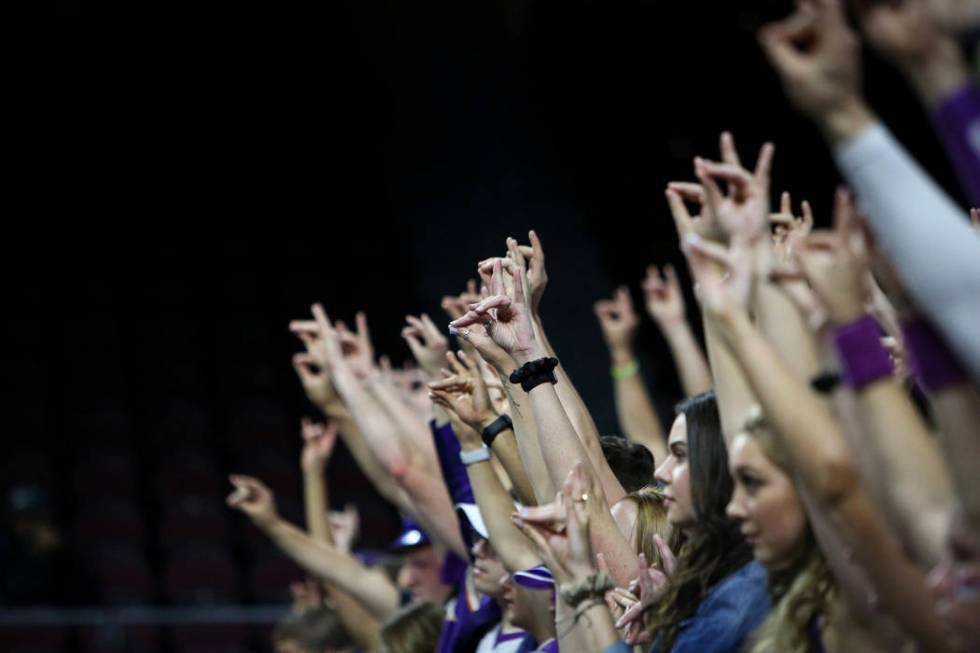 Fans in the Grand Canyon University student section "put their lopes up" to cheer on their team in the second half of the opening round of the Western Athletic Conference tournament agai ...